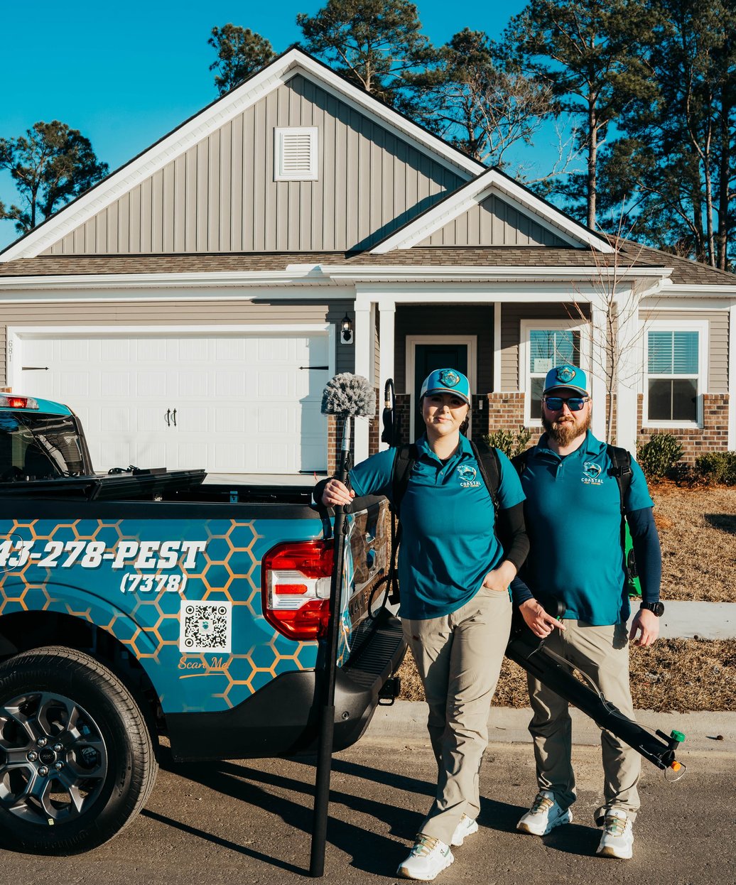 Pest control technician treating wall cavity